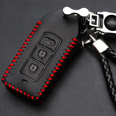 

Huashi Mitsubishi leather key case Outlander new strength cool smooth wing God Pajero Ling Yue real leather hand sewing key bag set modified special intelligent three-key black red line