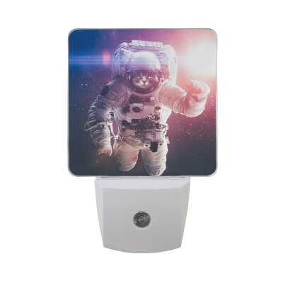 

ALAZA LED Night Light With Smart Dusk To Dawn SensorDead Astronaut In Outer Space Plug In Night Light