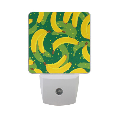 

ALAZA LED Night Light With Smart Dusk To Dawn SensorBananas Pattern Green Background Plug In Night Light