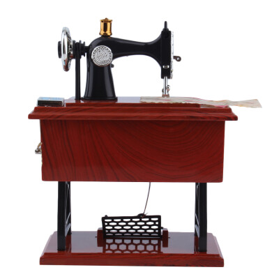 

Mini Antique Look Sewing Machine Mechanical Music Box Jewelry Box