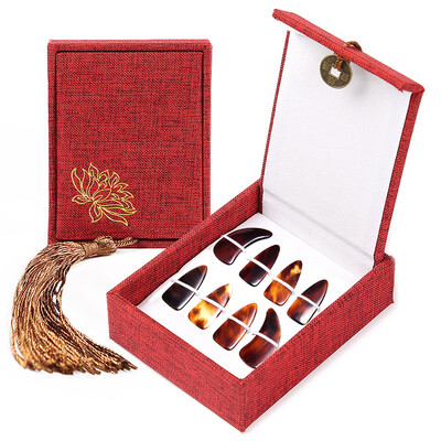 

【Jingdong Supermarket】 Acacia Bird (LOVEBIRD) Guzheng Nail Adult Child Nail Beginner Practice Musical Instrument Accessories Double-sided Thickening Section 8 Pack XS1034 Medium