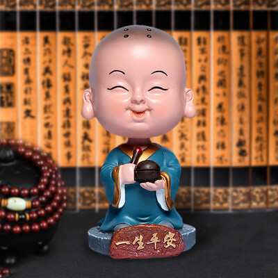 

Boliliang car decoration jewelry vibrating car car shaking head small monk car interior decoration car decoration supplies creative cute cartoon gifts laughing mouth often open