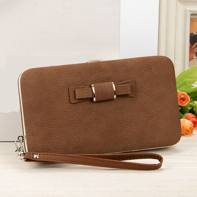 

The new solid color wallet in the long section of the multi-card phone bag bowknot lunch box female package tide