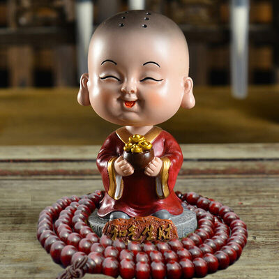 

Guangshunfa creative car decoration car decoration office decoration car ornaments shaking head small monk car ornaments cartoon car decoration products wish to become