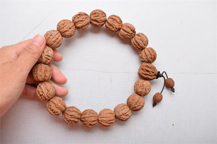 南疆石文玩核桃文玩核桃野生黄杆狮子头手串麻核桃把玩核桃手持精品