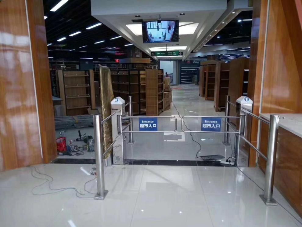 超市自动感应门卖场入口单向门进出口器摆闸只进不出圆形2柱雷达感应