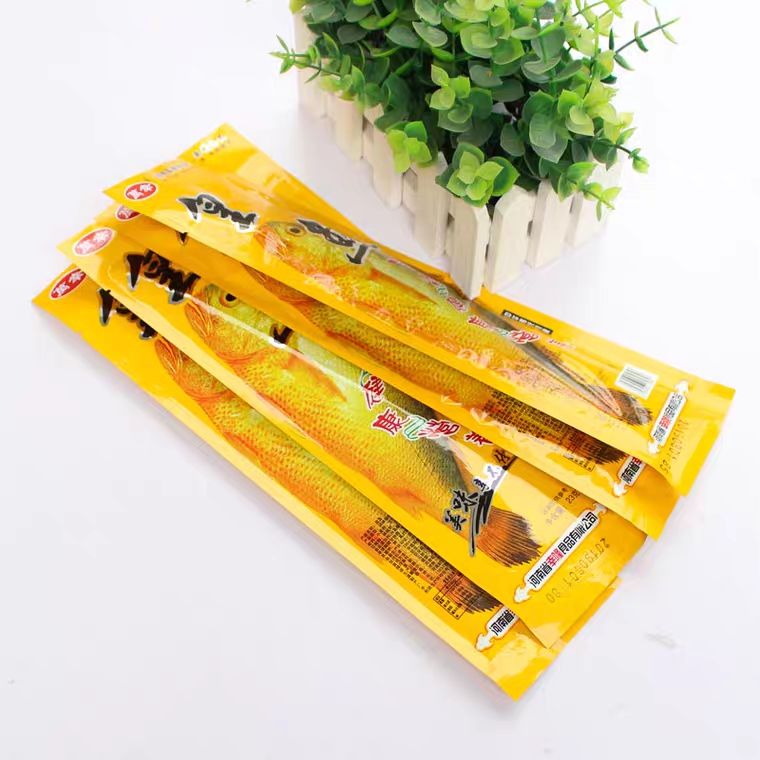 皇鱼23g袋辣条黄鱼辣条麻辣香辣儿时回忆休闲零食批发鱼酷辣条30袋