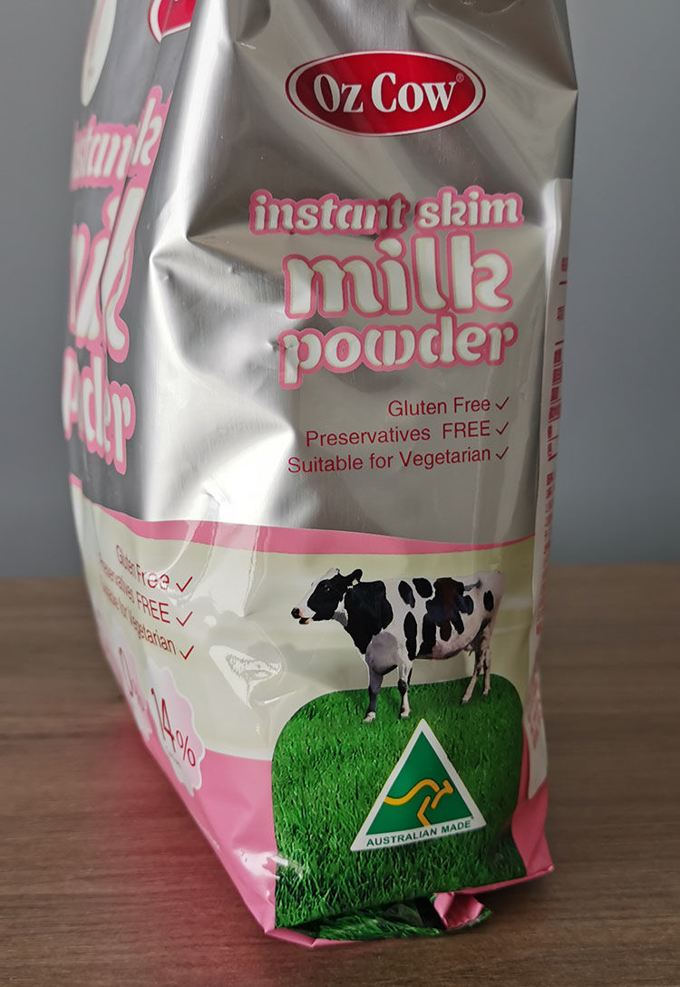 俄罗斯原装进口蓝牛奶粉原装金可澳ozcow奶粉脱脂速溶澳洲全脂儿童