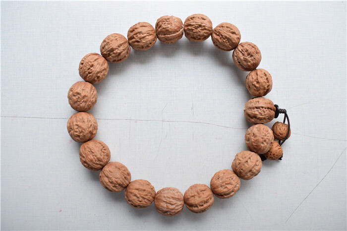 南疆石文玩核桃文玩核桃野生黄杆狮子头手串麻核桃把玩核桃手持精品