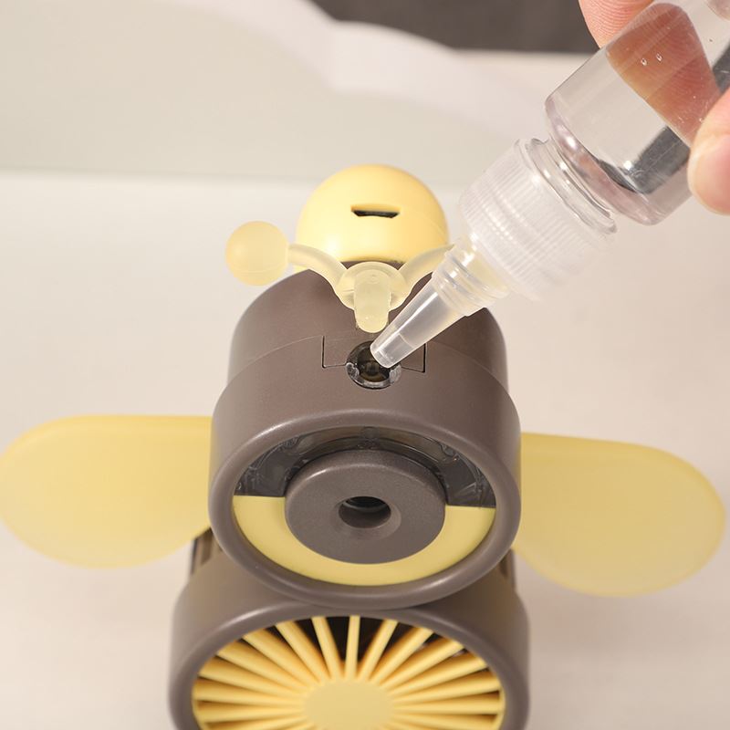 (gree)商场同款手持便携小风扇儿童玩具小学生水雾电风扇迷便携式女生