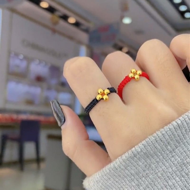 老凤凰顺丰速运999足金转运珠四叶草编织黄金戒指女小金珠黑绳食指