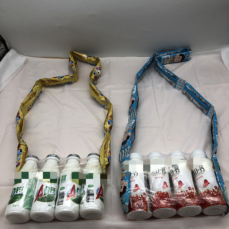 零食做的背包个包包阿尔e卑斯不b二家棒棒糖加ad钙奶旺仔牛奶连起来