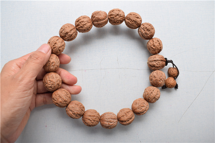 南疆石文玩核桃文玩核桃野生黄杆狮子头手串麻核桃把玩核桃手持精品