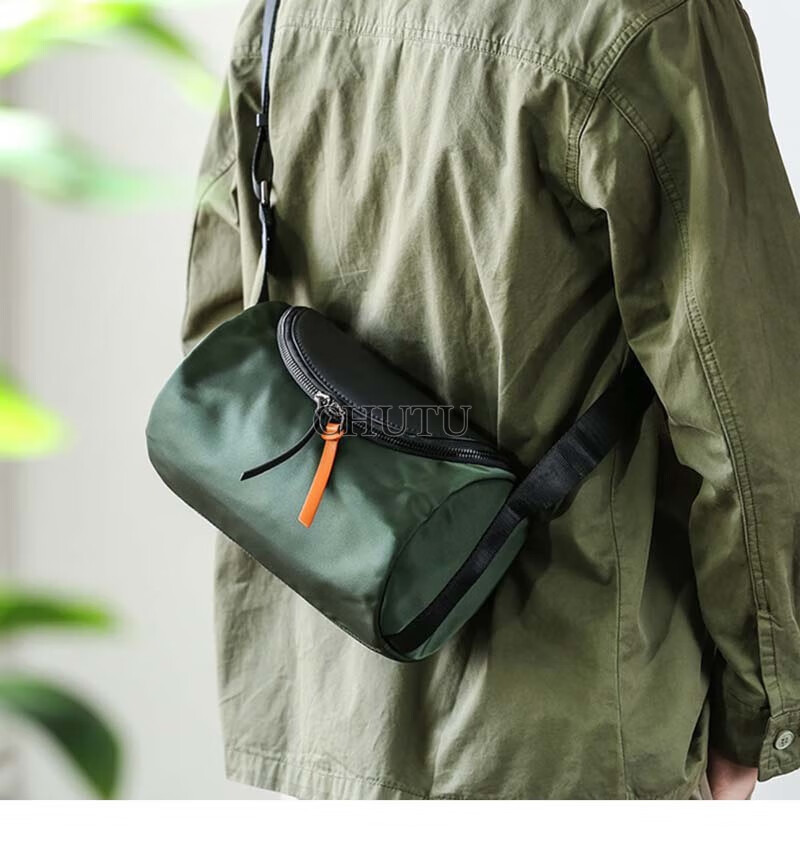 初徒 单肩包男时尚潮流小众设计圆筒包个性百搭防水运动休闲斜挎小背