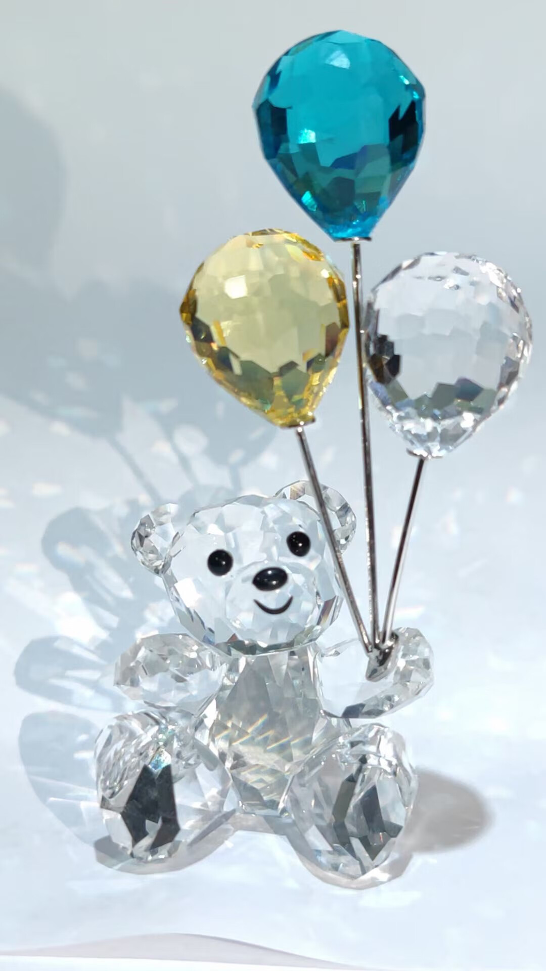 10043399463708商品名称:春节促销 6015施华洛世奇气球小熊女车