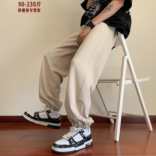 普戈斯（PUGESI）胖子大码华夫格裤子男春秋季休闲青少年长裤宽松束脚裤 K1049黑色常规 4XL 190-210斤