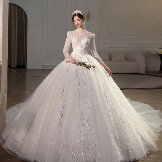 Red makeup best winter wedding dress 2025 new bridal main yarn high-end heavy industry trailing French long-sleeved wedding dress light champagne floor-length L