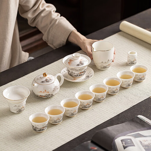 Gold inlaid jade mutton fat jade porcelain Kung Fu tea set Household ceramic white porcelain teapot tea cup tea set gift box Xishi pot ink river goat fat jade porcelain set