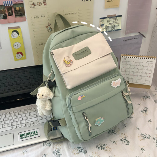 Yuanqian cartoon girl schoolbag female junior high school student cute girl fresh college style elementary school student lightweight backpack large capacity waterproof Korean version ins style high school student college student backpack green (with red face bear pendant + 3 medals)