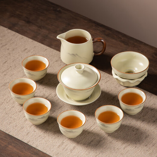Complete set of gold inlaid jade tea set, imitation Song Dynasty Ru kiln open-piece ceramic Kung Fu tea set, high-end tea set for home use, ink painting distant mountains