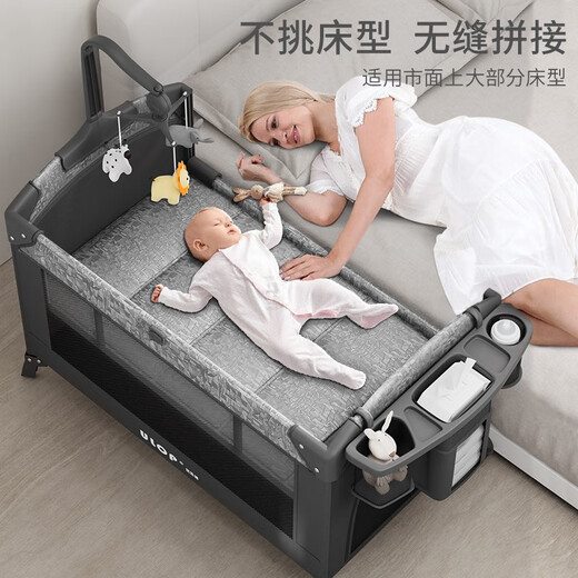 ULOP spliced crib multi-functional bed foldable mobile baby bed newborn baby sleep magic rocker extra large crib mosquito net + changing table + bed bell