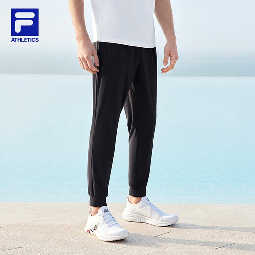 斐乐（FILA）官方男子针织高弹力凉感裤夏基础简约收口运动健身长裤 深黑-BK L