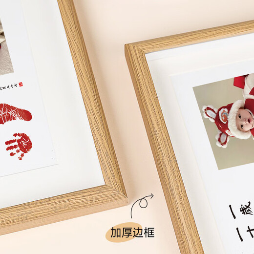 Catch Zhoulong baby's one-month-old hand and foot prints for 100 days of lanugo souvenirs. One-year-old hand and foot prints. Baby's 100-day photo frame with umbilical cord prints. A4 I'm one month old. Customized photo.