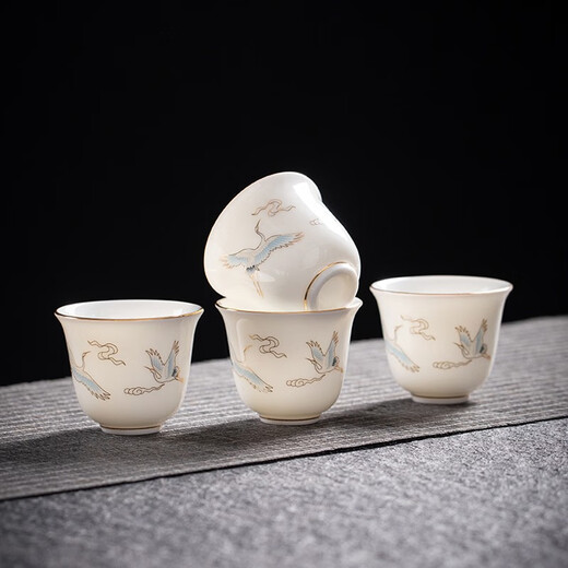 Yushige mutton-fat jade white porcelain Kung Fu tea set high-end simple home office reception ceramic bowl set of 8 cups with golden auspicious crane and auspicious orchid fragrance eight cups safety package 12 pieces (safety packaging) free tea towel