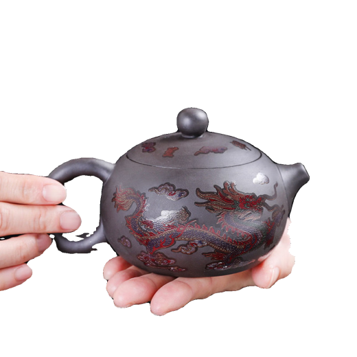 Minghuitong Fengming Zisha teapot will change color when exposed to heat. Dragon and Phoenix teapot for tea health care. Dragon and Phoenix Chengxiang high-end Chinese tea set black gift box 225ml Dragon and Phoenix teapot.