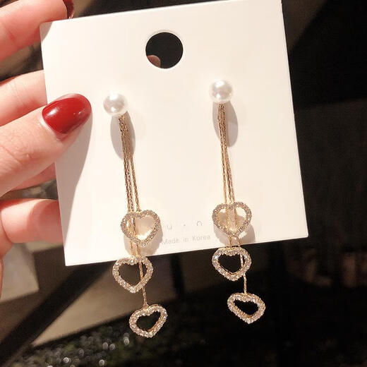 Han Shengsheng S925 Pendientes de aguja de plata Pendientes Año Nuevo Temperamento Versátiles Versátiles Pendientes largos Pendientes de moda