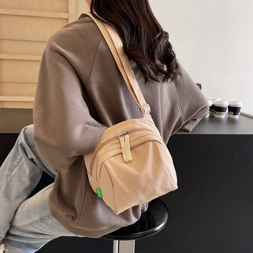 Cool Dani travaille pour divers sports et téléphone mobile décontracté, un petit sac à bandoulière pour les femmes 2025 Nouveau sac de sac en cartouche léger sac khaki