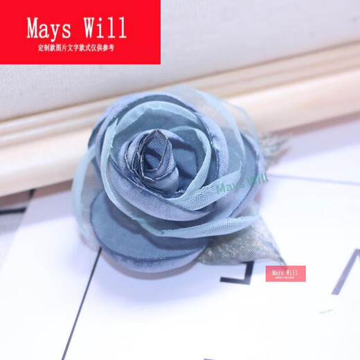 Mays Will temperament camellia brooch fabric Japanese and Korean female flowers long blue needle.