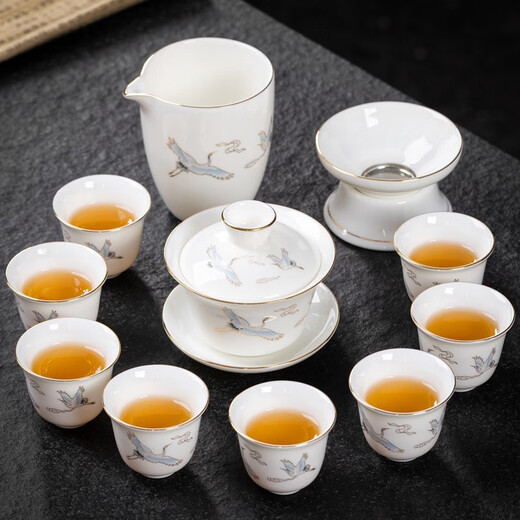 Yushige mutton-fat jade white porcelain Kung Fu tea set high-end simple home office reception ceramic bowl set of 8 cups with golden auspicious crane and auspicious orchid fragrance eight cups safety package 12 pieces (safety packaging) free tea towel
