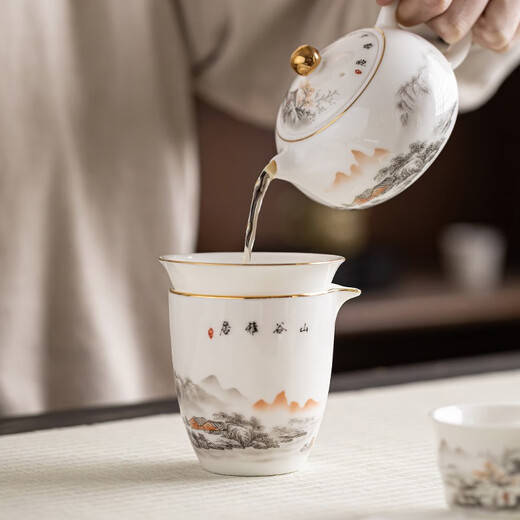 Gold inlaid jade mutton fat jade porcelain Kung Fu tea set Household ceramic white porcelain teapot tea cup tea set gift box Xishi pot ink river goat fat jade porcelain set