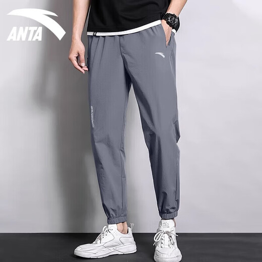 ANTA (ANTA) Sports Long Pants Men's 2026 Autumn and Winter Ice Silk Breathable Trendy Running Thin Loose Quick-drying Sports Pants Men's Pants A Basic Gray Tie-Up (Ice Silk Quick-drying) XL /180 Suitable for 140-160Jin Jin is equal to 0.5 kg