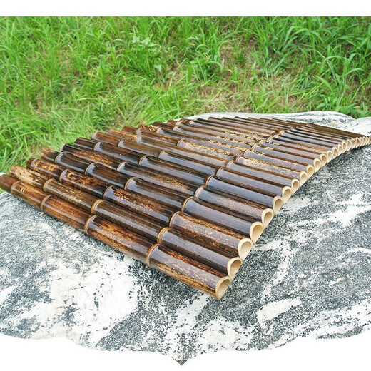 Fenghai famous artist Xiao musical instrument professional pan flute 25 tube g tune purple bamboo playing level pan flute instrument 25 Miao pan flute universal direct sales professional 25 tube G tune + grand gift