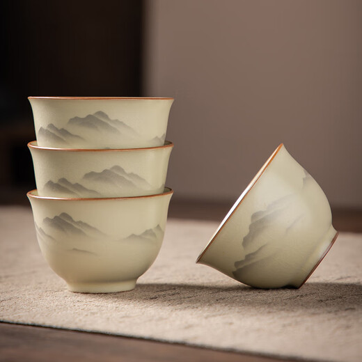 Complete set of gold inlaid jade tea set, imitation Song Dynasty Ru kiln open-piece ceramic Kung Fu tea set, high-end tea set for home use, ink painting distant mountains