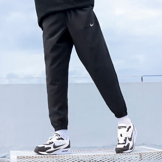 Nike (Nike) Спортивный костюм Мужчина 25 Летний новый ветропроницаемый тканый куртка с капюшоном фитнес. Кратко усугубляющая брюки.