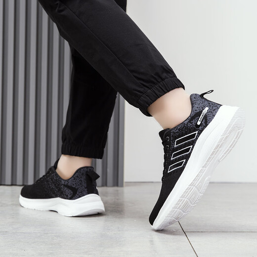 Zheduan Sports Schuhe Frühling und Sommer Neue Männerschuhe Herren lässige Laufschuhe Student Atmungsfreie Kleidung-resistente weiche Sohle-Stoßdämpfung fliegender Messer FH-Feda 9905 Schwarz-Weiß-Hintergrund 41
