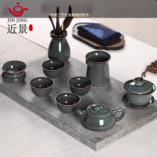 Close-up Longquan celadon tea set handmade Ge kiln iron tire ceramic complete set household ice cracked teapot teacup cover bowl iron tire cover bowl tea set hardcover version 10 pieces gift box