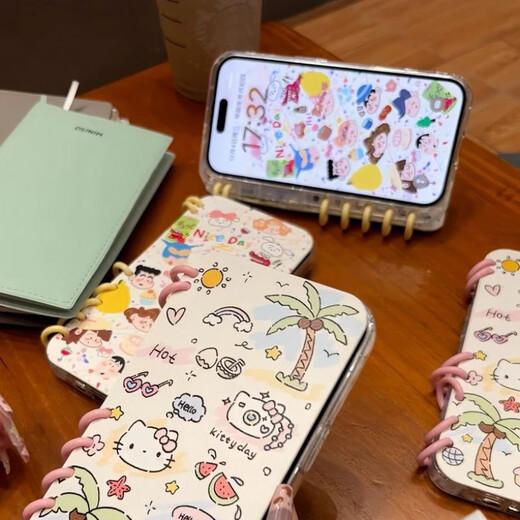 迅炫翻盖笔记本涂鸦KT猫小新适用苹果16promax手机壳iphone15/14新款13pro书本12promax创意ip11卡通可 书本壳【涂鸦风卡通凯蒂猫+粉色书环】 iPhone 16 Pro 