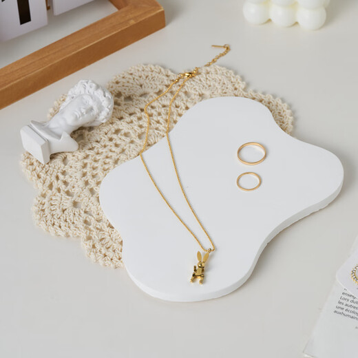 Light and shadow stars white gypsum ornaments ins style decoration scene construction and layout small objects photography props jewelry necklace ring earrings still life product photography creativity big cube aromatherapy candle