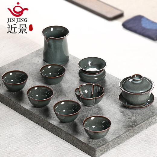 Close-up Longquan celadon tea set handmade Ge kiln iron tire ceramic complete set household ice cracked teapot teacup cover bowl iron tire cover bowl tea set hardcover version 10 pieces gift box