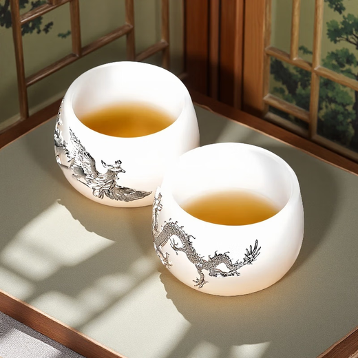 Xianjuren high-end sky blue Ru kiln gilt jade porcelain tea set light luxury gift mutton fat jade tea kung fu bowl gift box Ru Qing jade porcelain tea set gentian cup 12 pieces