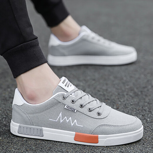 Changxiang Huili 2025 Spring Nouvelles chaussures de toile pour hommes Coréens Style Chaussures de planche pour hommes Chaussures en tissu polyvalent chaussures de chaussures à la mode 6636 noir et blanc 44