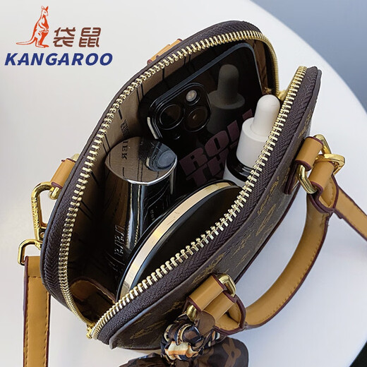 Kimberley Kangaroo Shell Bag Damenhandtasche kleine Tasche 2025 Neue trendige Crossbody -Tasche, die vielseitige alte Blumen Umhängetasche Kaffee großer Größe Schal pendeln
