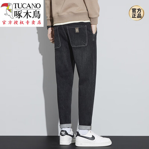 啄木鸟（TUCANO）春夏新款牛仔裤男松紧腰带宽松春秋小脚长裤子抽绳弹力休闲哈伦裤 蓝色 8831(款) 常规 28 码(2尺1腰围)