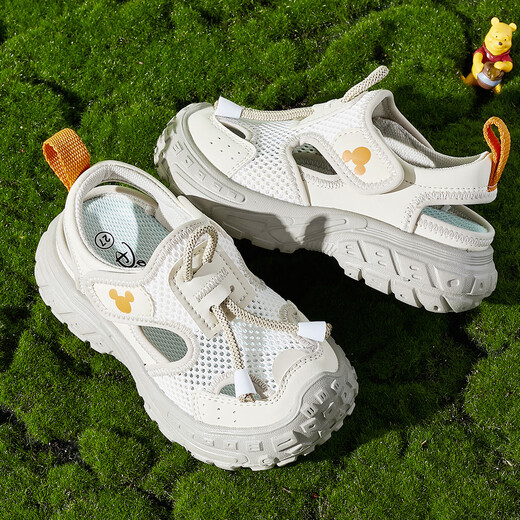 Disney (Disney) Sandales pour enfants Anti-slip Soft Sole Hollow Hollow Hollow Shoes Nouveau style d'été hommes et filles pataugeant et streaming chaussures de plage extérieures gris 31 pieds longueur 19.2-19.7