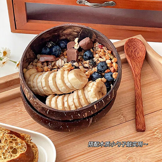Badger yogurt bowl with spoon wooden dessert fruit salad home breakfast oatmeal natural coconut shell bowl