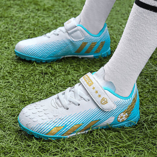 Anta Kids Anta Site officiel Chaussures de football pour enfants Nails Brokés Men et filles Tores d'entraînement Cuir Surface Glue ongles